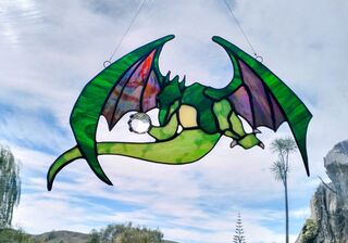 Stained glass dragons, fairies and mermaids